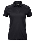 Tee Jays Ladies Luxury Sport Polo Shirt showing tailored women's fit short sleeves and moisture-wicking performance fabric